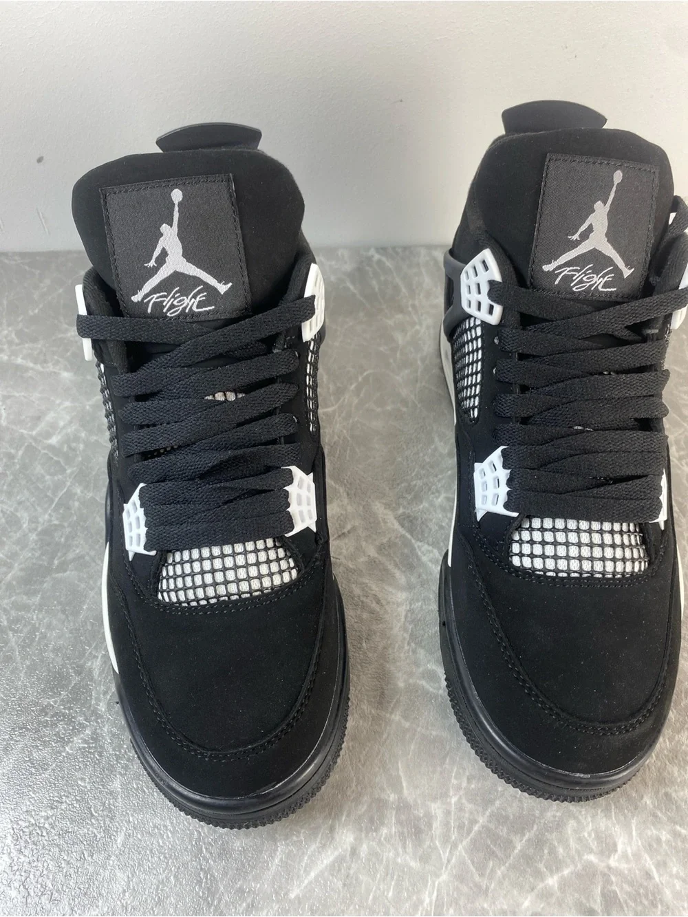 Jordan Black and White Low-Top Retro Sneakers